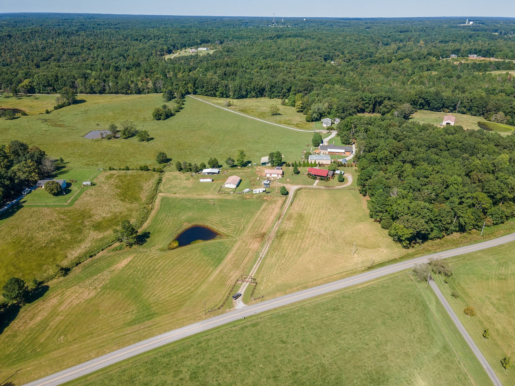 580 Eno Road Dickson, TN 37055 - Photo 30 of 48 an aerial view of residential houses with outdoor space