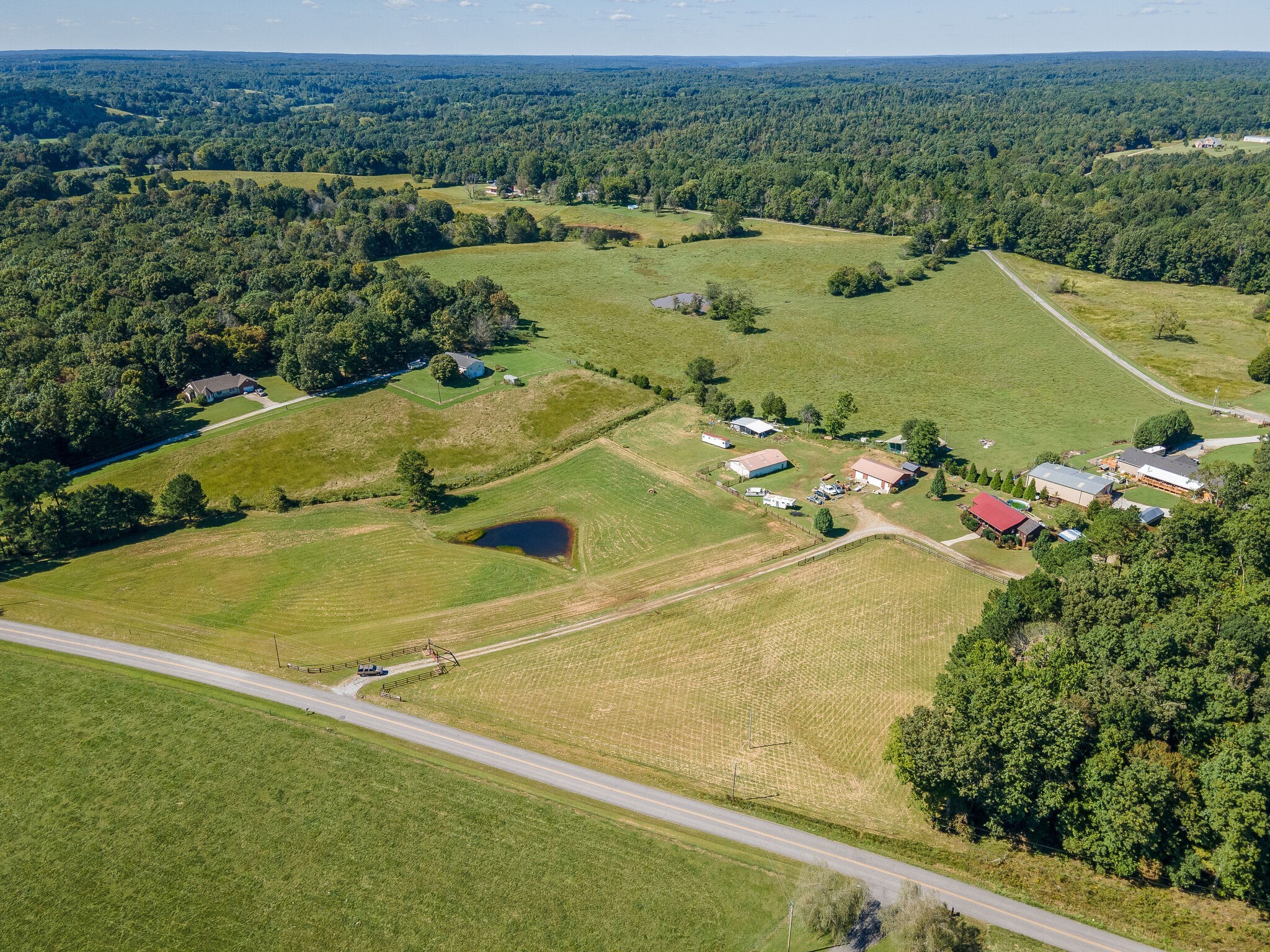 580 Eno Road Dickson, TN 37055 - Photo 32 of 48 an aerial view of residential houses with outdoor space