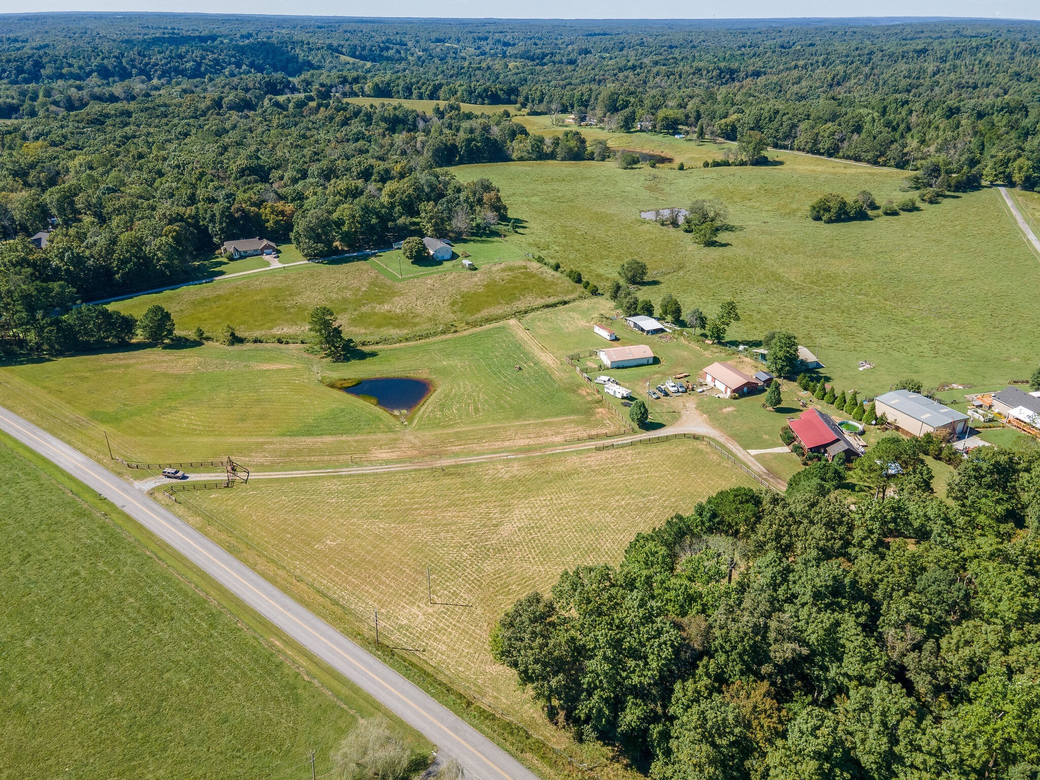 580 Eno Road Dickson, TN 37055 - Photo 33 of 48 an aerial view of residential houses with outdoor space