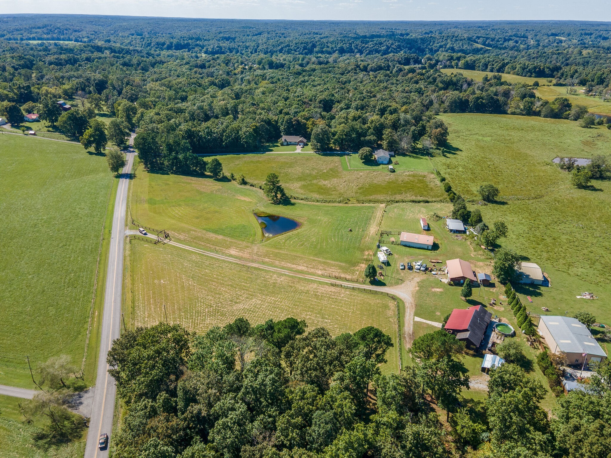 580 Eno Road Dickson, TN 37055 - Photo 34 of 48 an aerial view of a houses with a lake view
