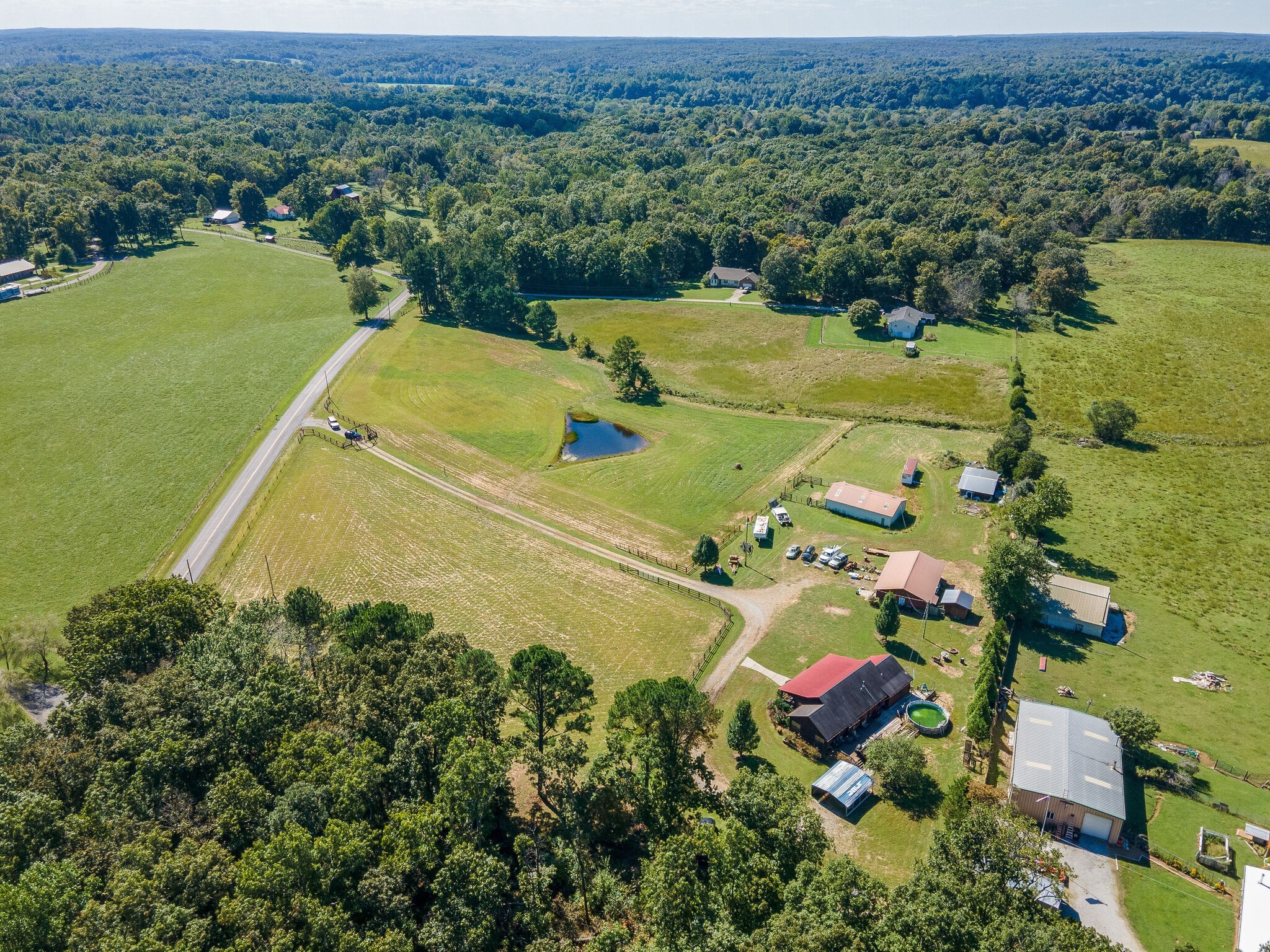 580 Eno Road Dickson, TN 37055 - Photo 35 of 48 an aerial view of a house with a lake view