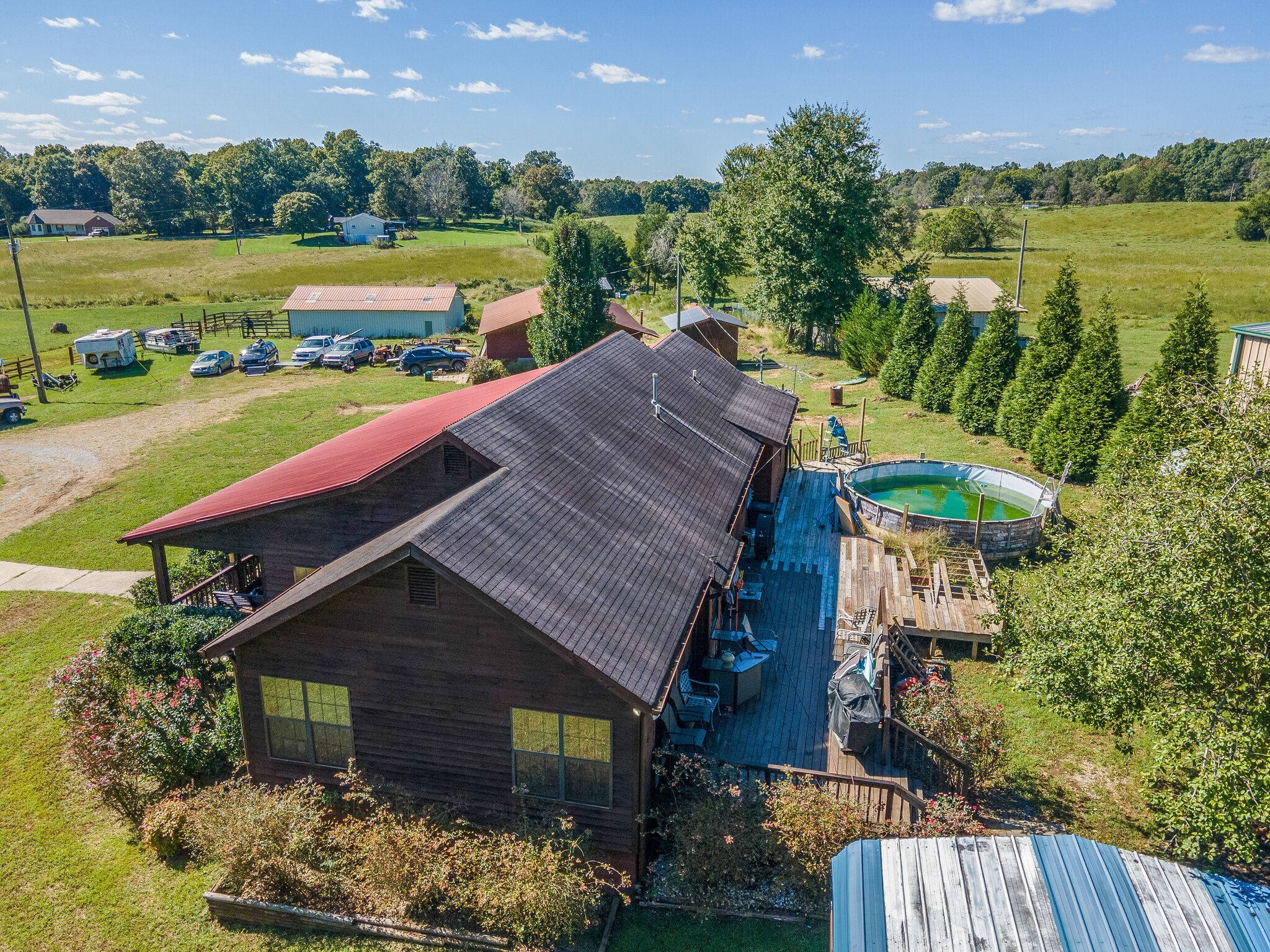 580 Eno Road Dickson, TN 37055 - Photo 45 of 48 an aerial view of a house with a yard and lake view