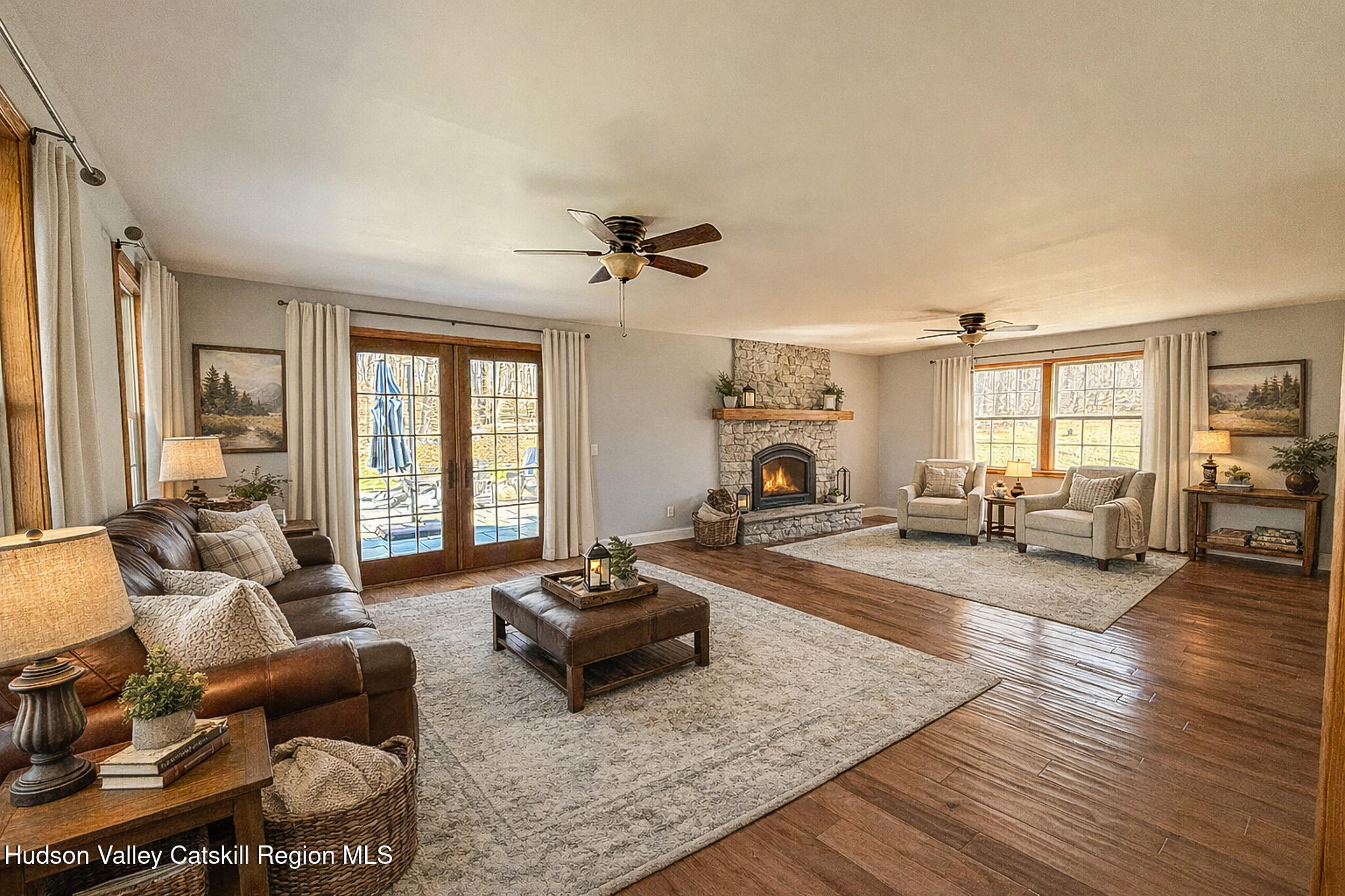 521 Hall Hill Road Ancram, NY 12502 - Photo 14 of 34 a living room with furniture and a large window