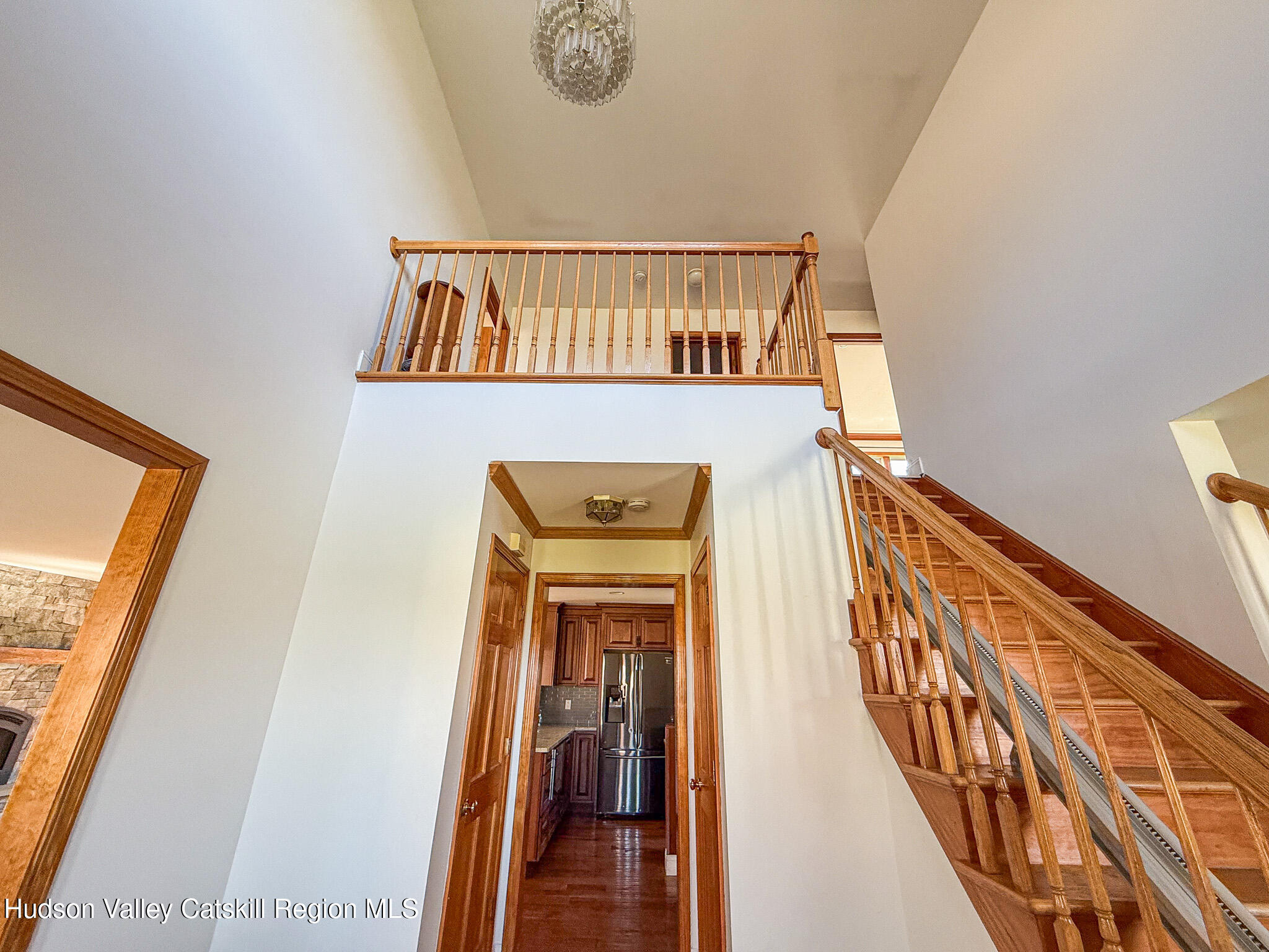 521 Hall Hill Road Ancram, NY 12502 - Photo 18 of 34 a view of a hallway with wooden floor and staircase