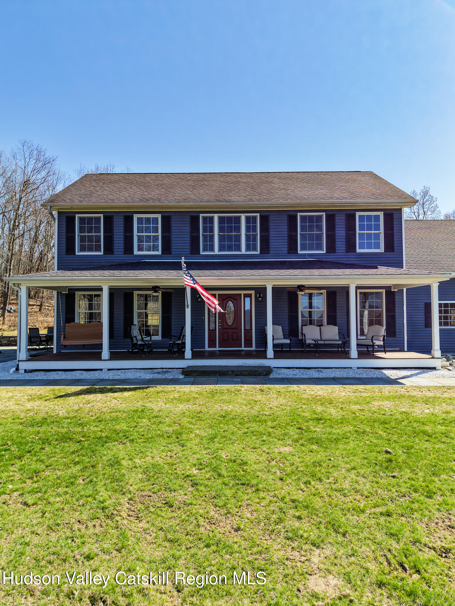 521 Hall Hill Road Ancram, NY 12502 - Photo 2 of 34 a view of a large pool with a lawn chairs and a yard with a large tree