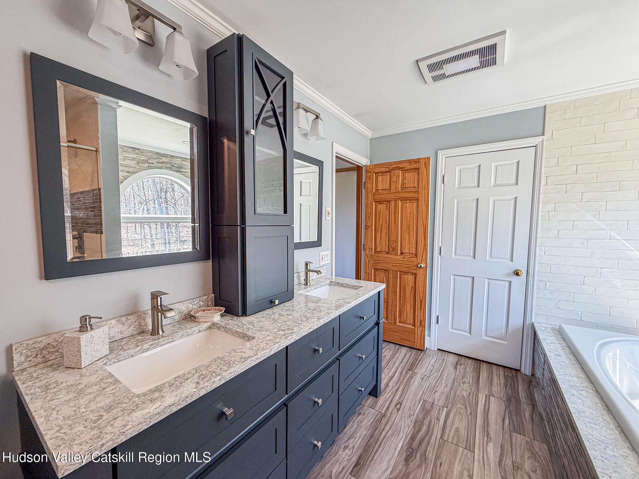521 Hall Hill Road Ancram, NY 12502 - Photo 21 of 34 a bathroom with a granite countertop sink and a mirror