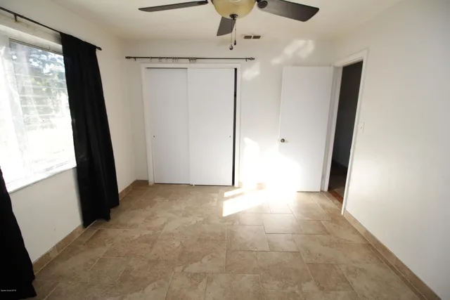 an empty room with window