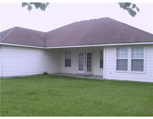 a view of a house with a garden