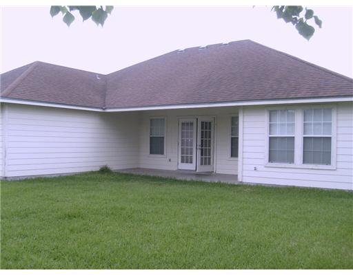 4237 Aaron Cove Corpus Christi, TX 78413 - Photo 4 of 5 a view of a house with a garden