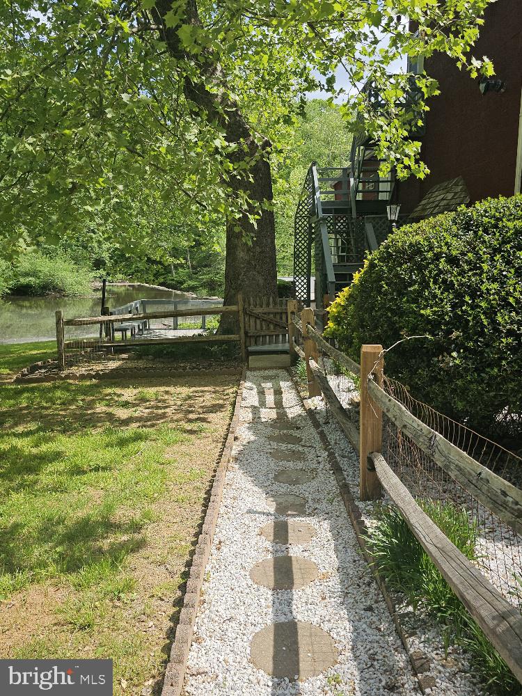 6908 South Roxbury Mill Road Spotsylvania, VA 22551 - Photo 16 of 92 a view of yard with large trees