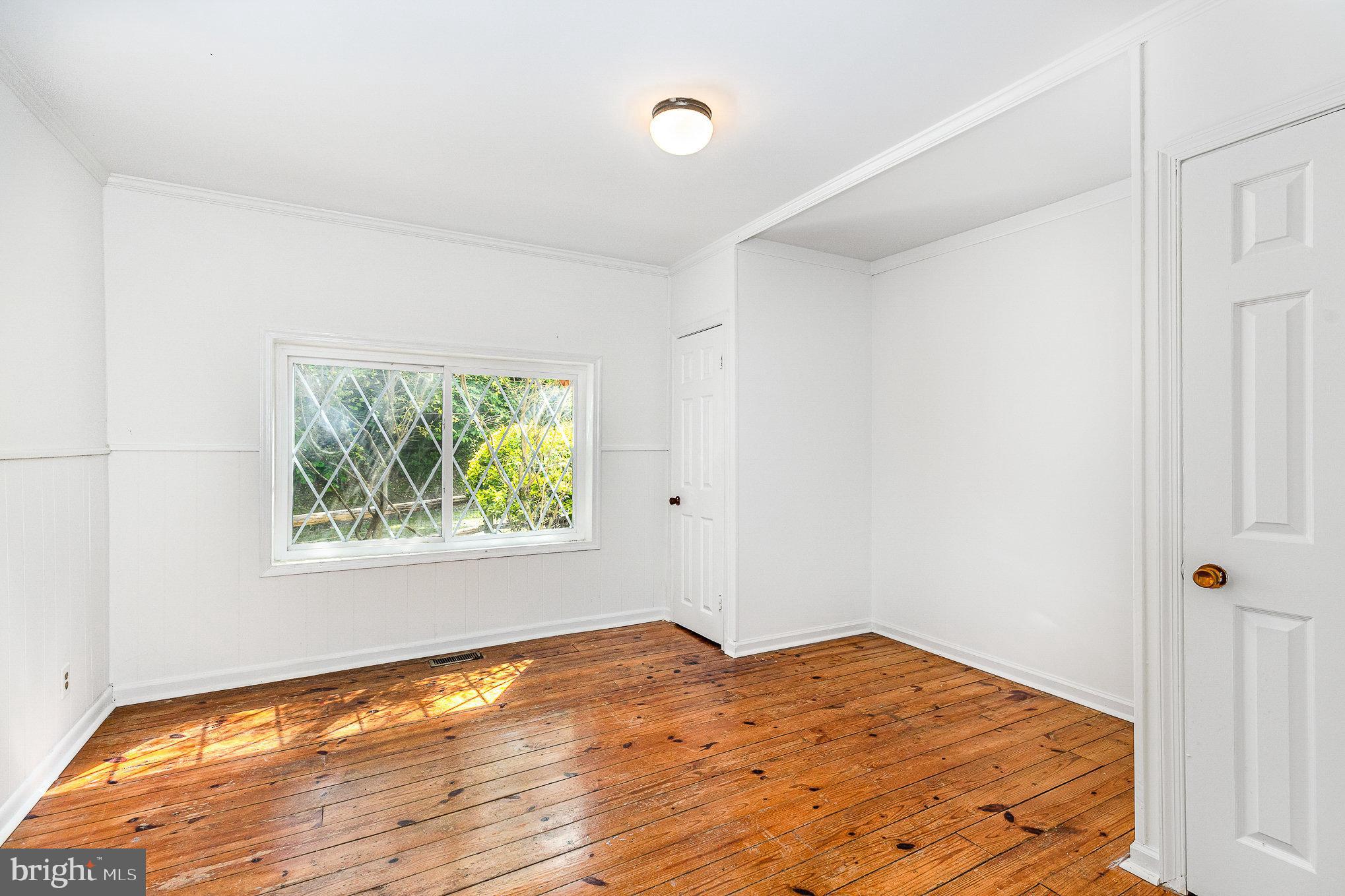 6908 South Roxbury Mill Road Spotsylvania, VA 22551 - Photo 34 of 92 a view of an empty room and window