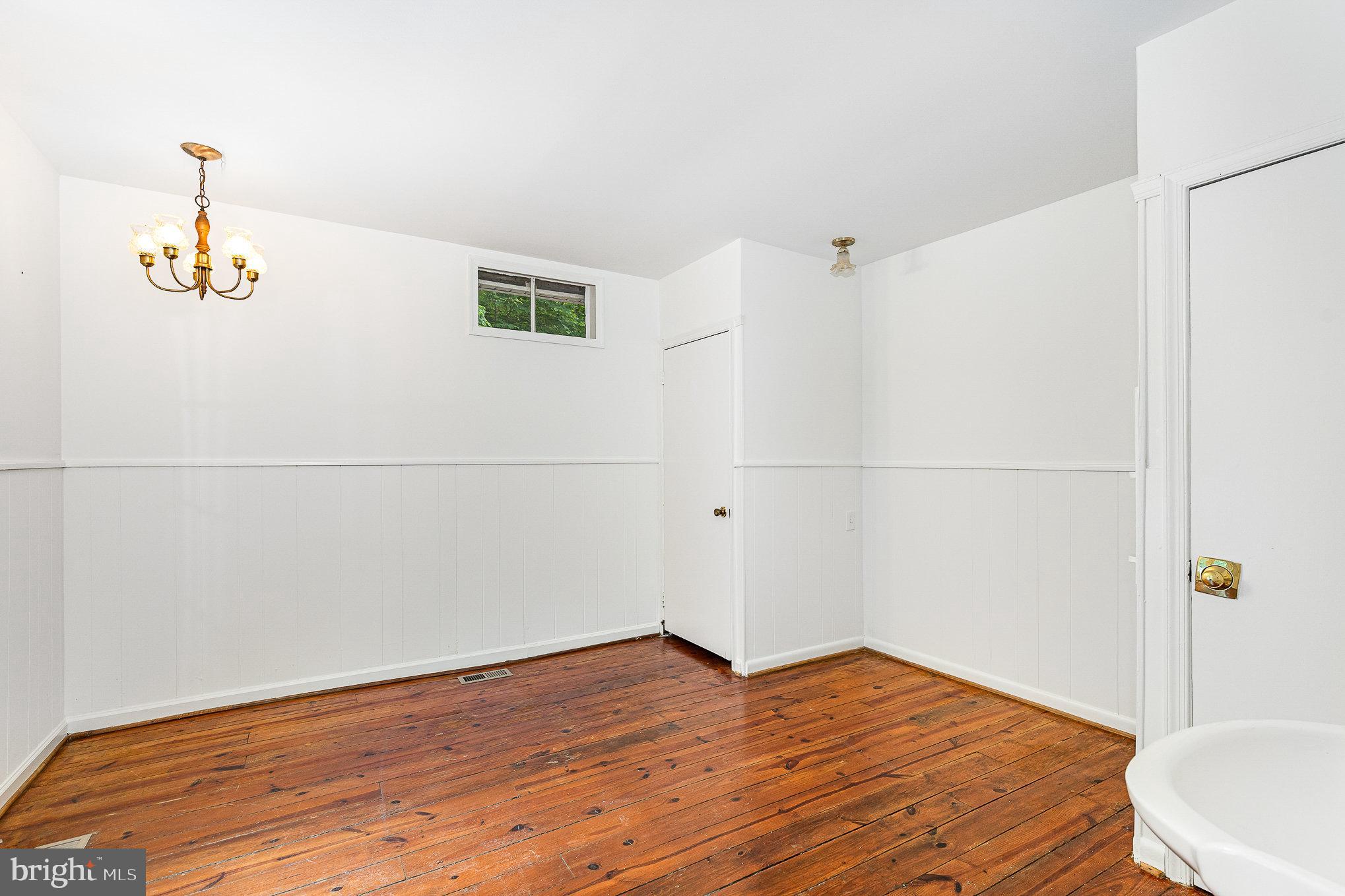 6908 South Roxbury Mill Road Spotsylvania, VA 22551 - Photo 36 of 92 a bathroom with a sink and a mirror