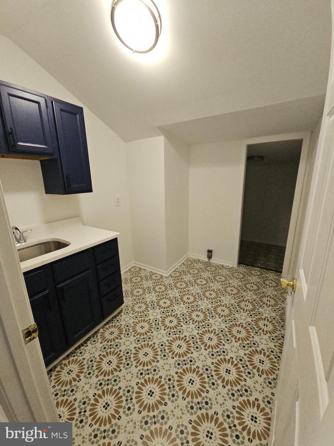 6908 South Roxbury Mill Road Spotsylvania, VA 22551 - Photo 63 of 92 a bedroom with a bed and cabinets
