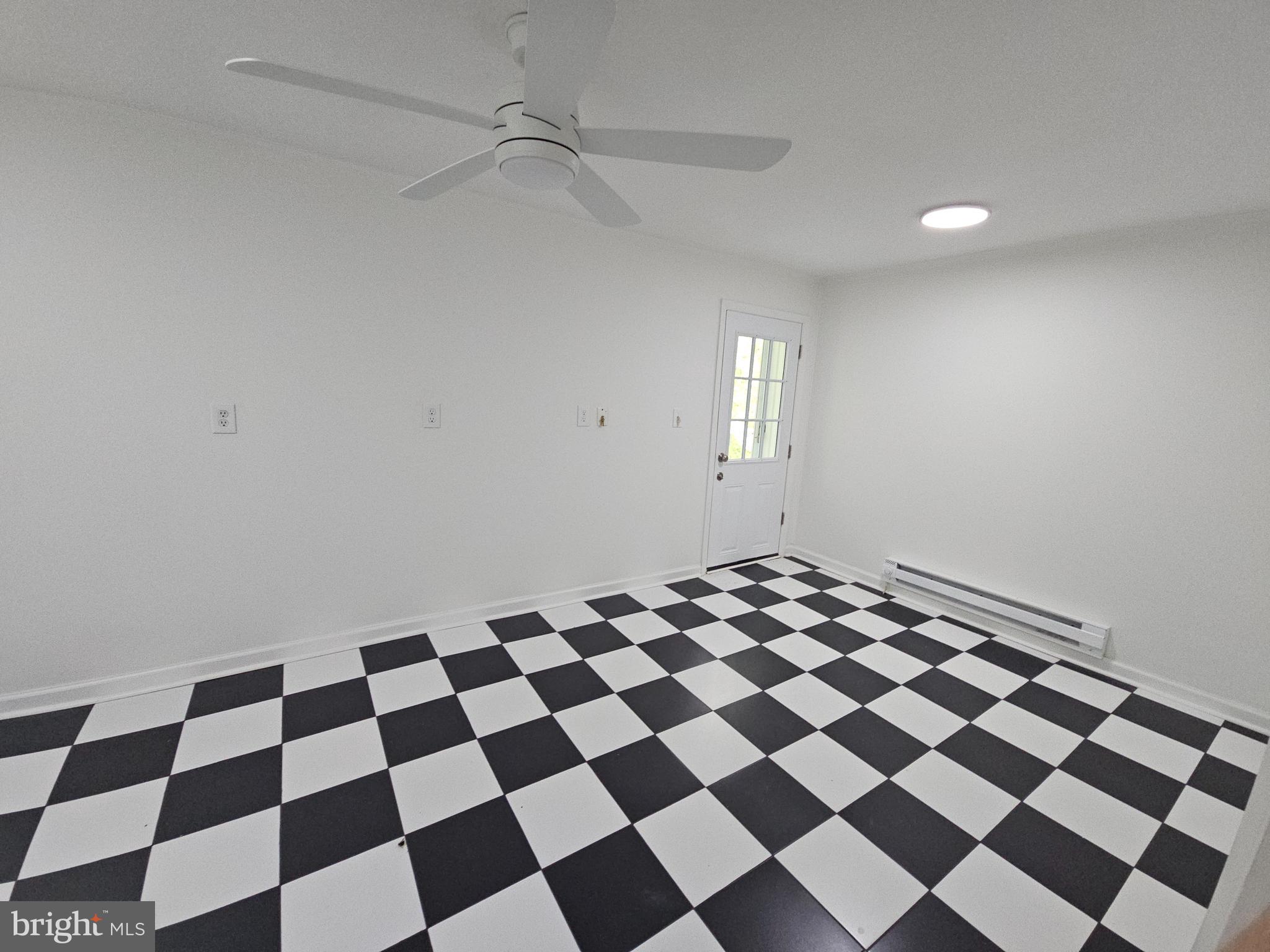 6908 South Roxbury Mill Road Spotsylvania, VA 22551 - Photo 78 of 92 a black and white checkered floor