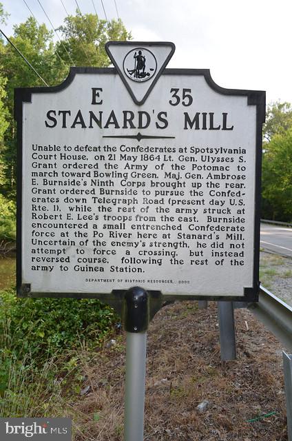 6908 South Roxbury Mill Road Spotsylvania, VA 22551 - Photo 8 of 92 a sign on the side of a road