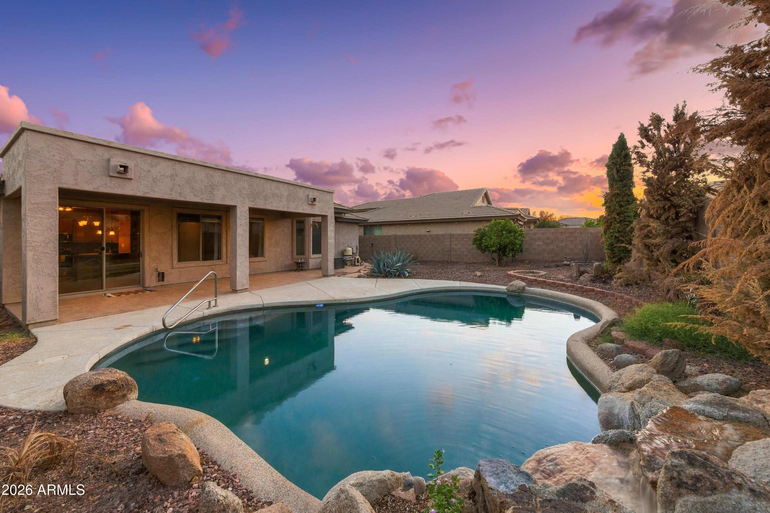 15338 West Boca Raton Road Surprise, AZ 85379 - Photo 3 of 41 Back at Twilight