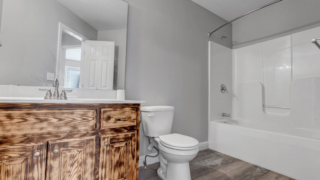 69 Robertson Hollow Road Taft, TN 38488 - Photo 16 of 21 a bathroom with a sink toilet and shower
