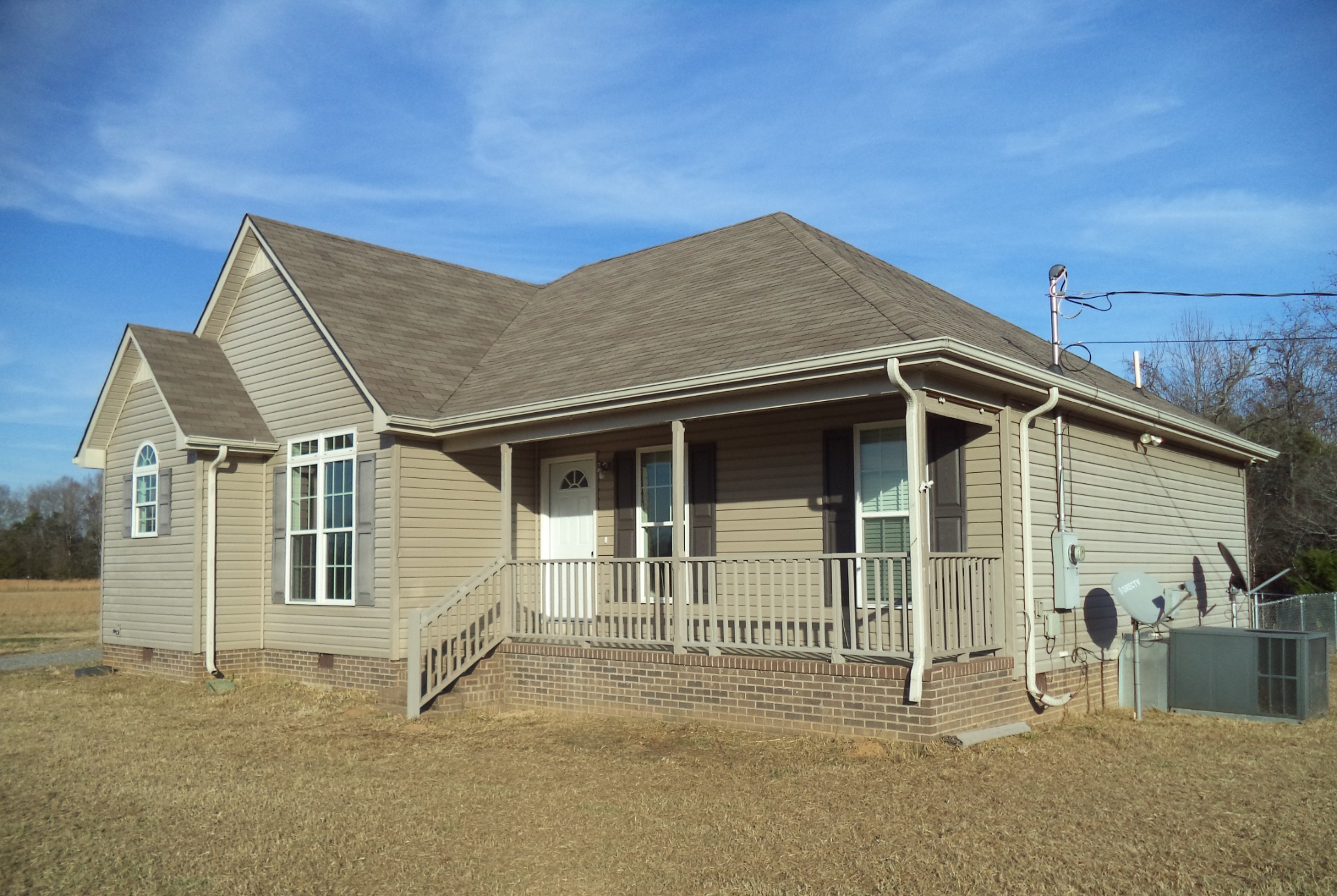 69 Robertson Hollow Road Taft, TN 38488 - Photo 3 of 21 a house with white door