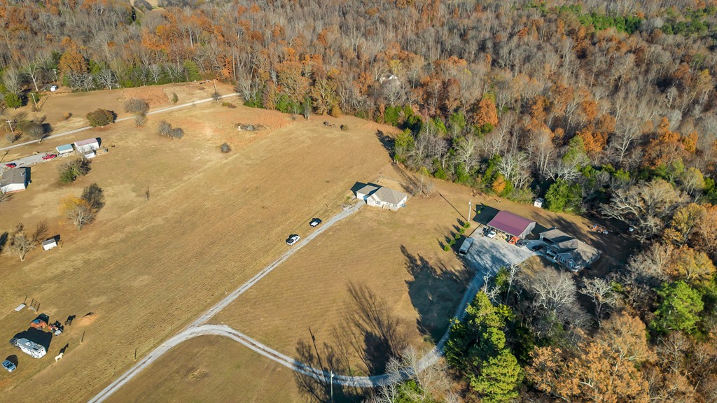 69 Robertson Hollow Road Taft, TN 38488 - Photo 5 of 21 an aerial view of a house with a yard