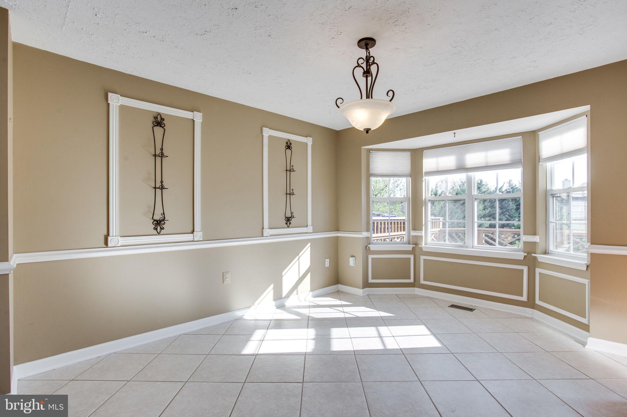 6121 Baldridge Circle Frederick, MD 21701 - Photo 16 of 60 a spacious bathroom with a large tub and shower