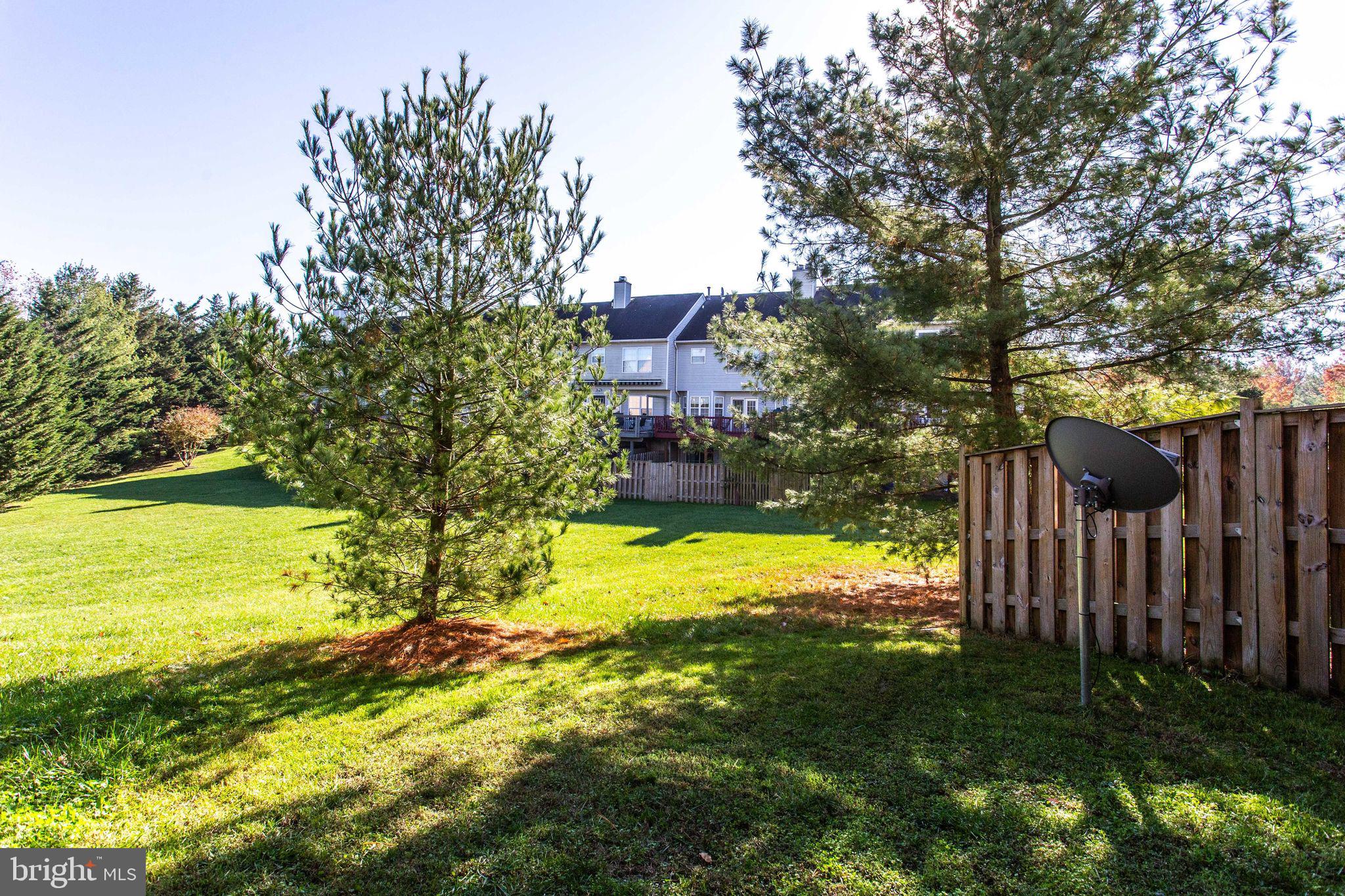 6121 Baldridge Circle Frederick, MD 21701 - Photo 25 of 60 a view of a house with a yard