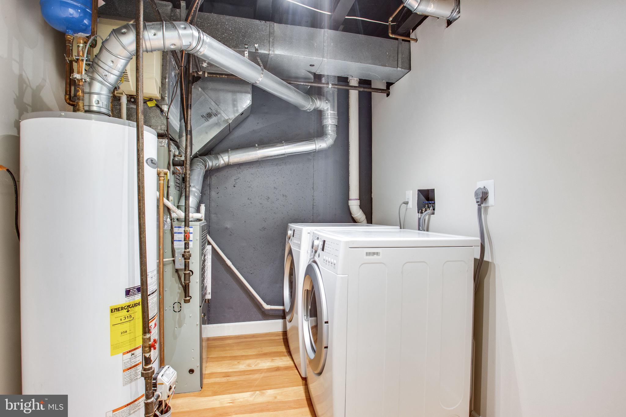 6121 Baldridge Circle Frederick, MD 21701 - Photo 48 of 60 a view of hallway with washer and dryer