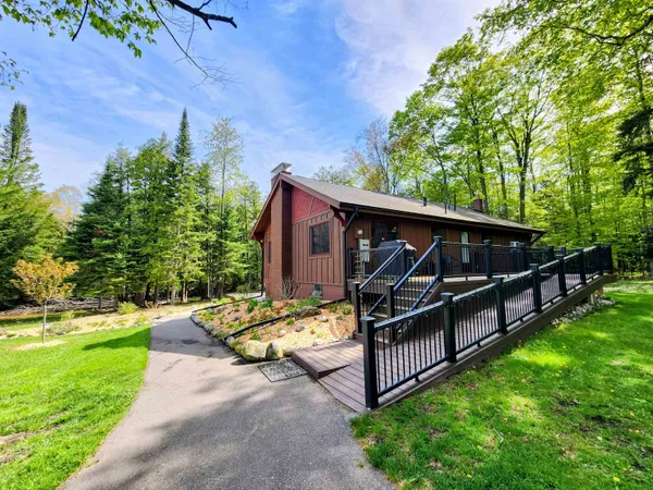 $440,000 | 6075 Cedar River Road, Mancelona, MI 49659
