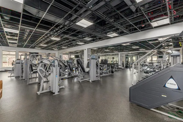 a view of water heater room with gym equipment