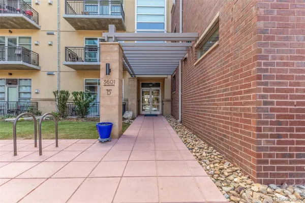 a view of front door of house and entertaining space