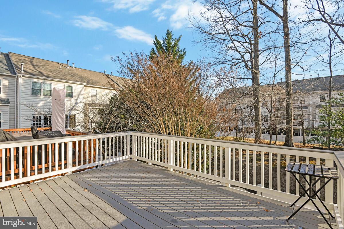12025 Edgemere Circle Reston, VA 20190 - Photo 14 of 37 a view of a wooden roof deck