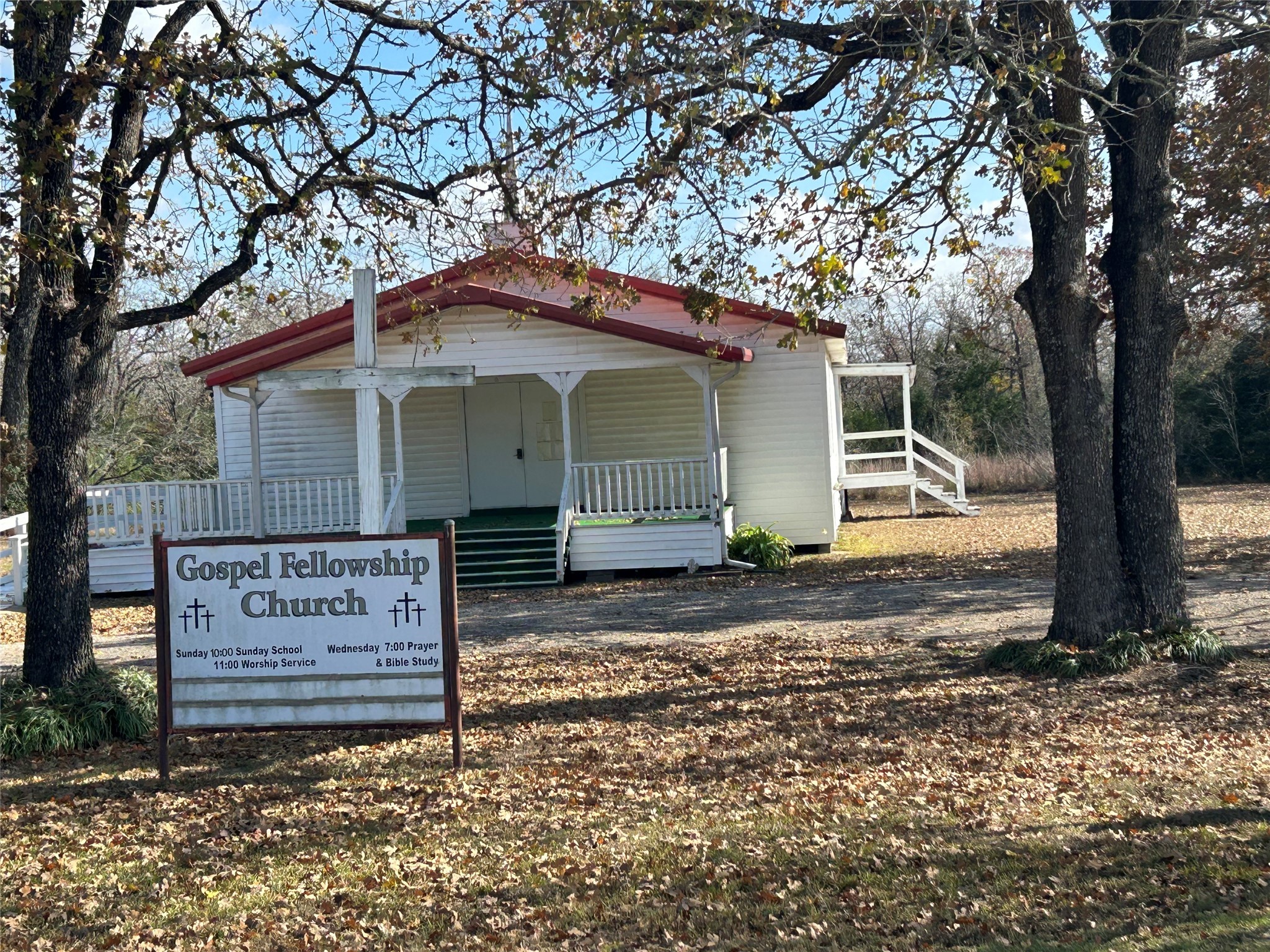 0 North Berry Ridge North Caldwell, TX 77836 - Photo 7 of 8 a view of a house with a tree next to a road