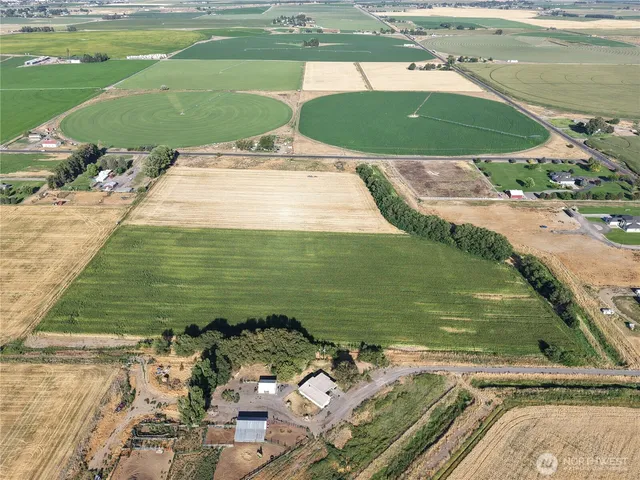 a view of a swimming pool and a yard