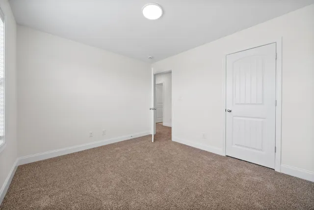 an empty room with an entryway