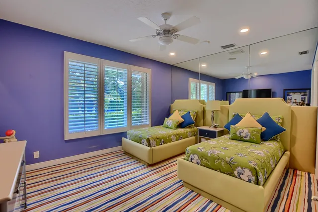a living room with a couch and a rug