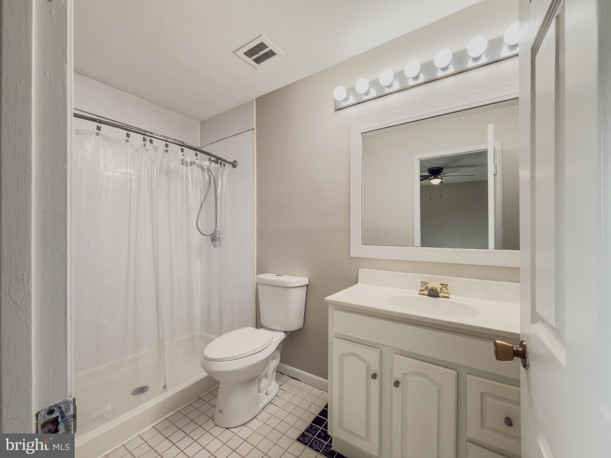 14900 Hydrus Road Silver Spring, MD 20906 - Photo 22 of 30 Bright and inviting bathroom retreat.