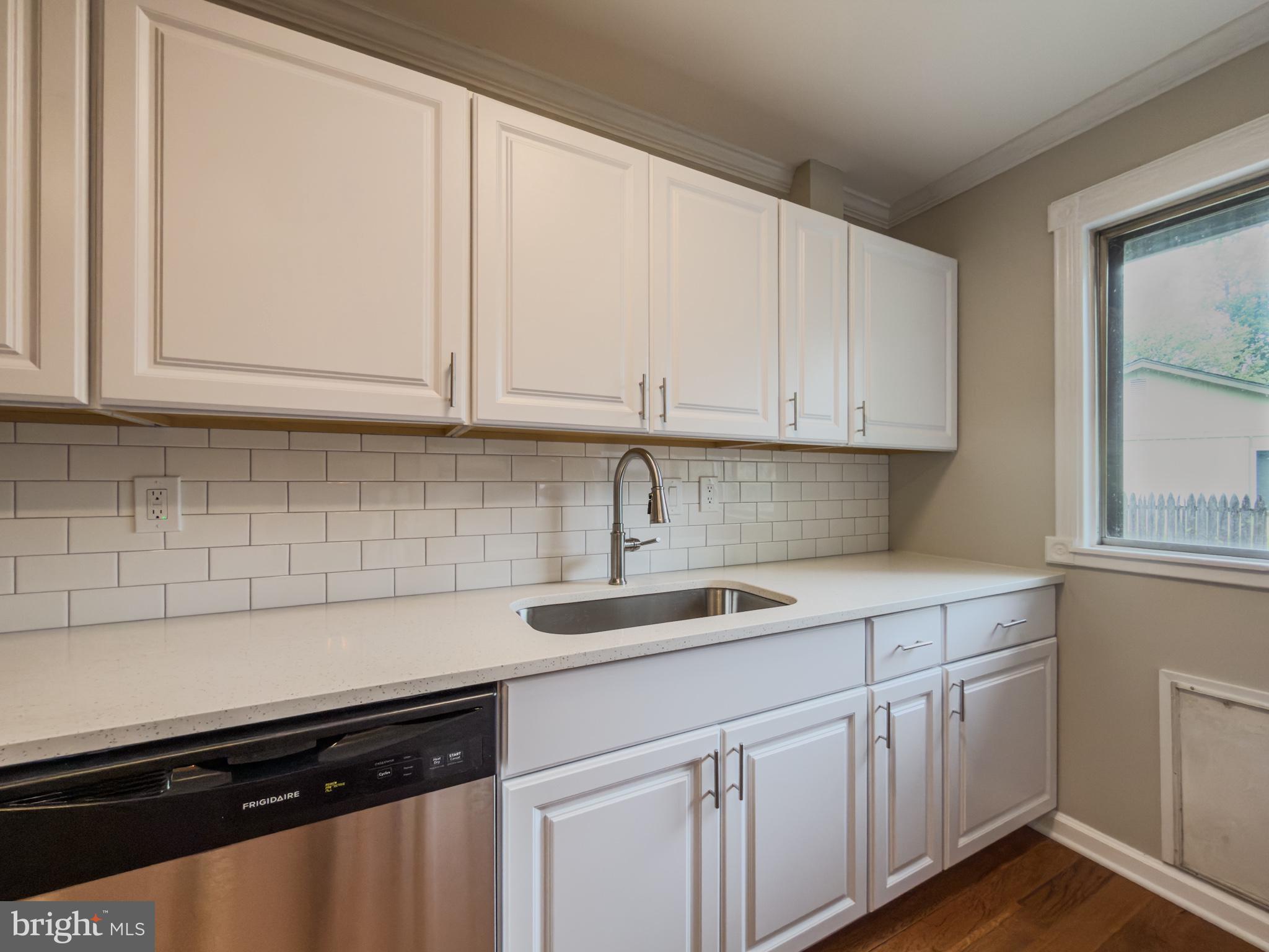 14900 Hydrus Road Silver Spring, MD 20906 - Photo 4 of 30 Bright and modern kitchen space.