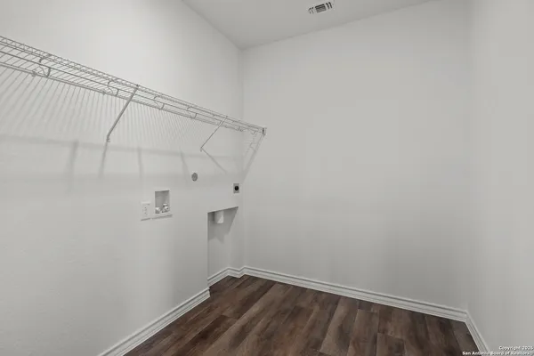 a view of small space with racks on the wall