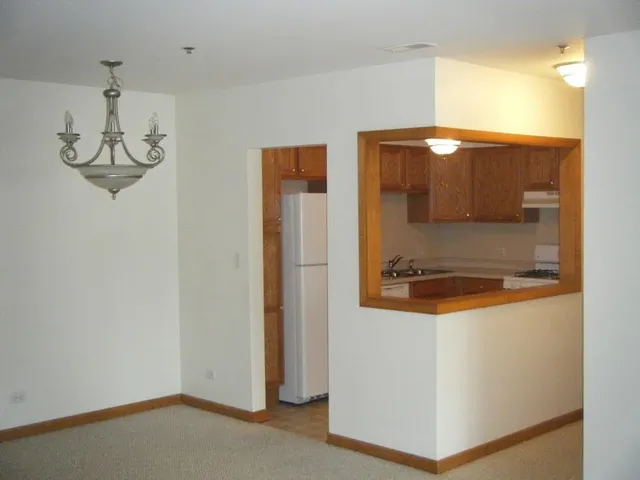 a bathroom with a shower and mirror