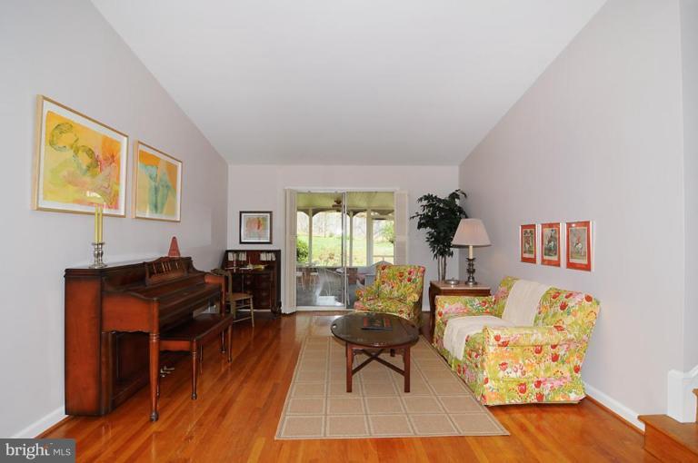 417 Waterford Road Silver Spring, MD 20901 - Photo 2 of 25 a living room with furniture and wooden floor