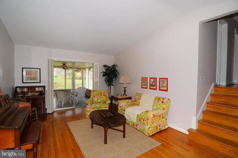 417 Waterford Road Silver Spring, MD 20901 - Photo 13 of 25 a living room with furniture and wooden floor