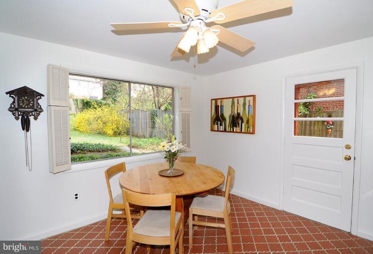 417 Waterford Road Silver Spring, MD 20901 - Photo 18 of 25 a dining room with furniture and a window