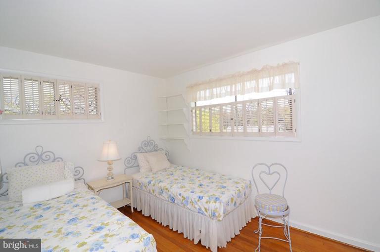 417 Waterford Road Silver Spring, MD 20901 - Photo 8 of 25 a bedroom with a bed and a window
