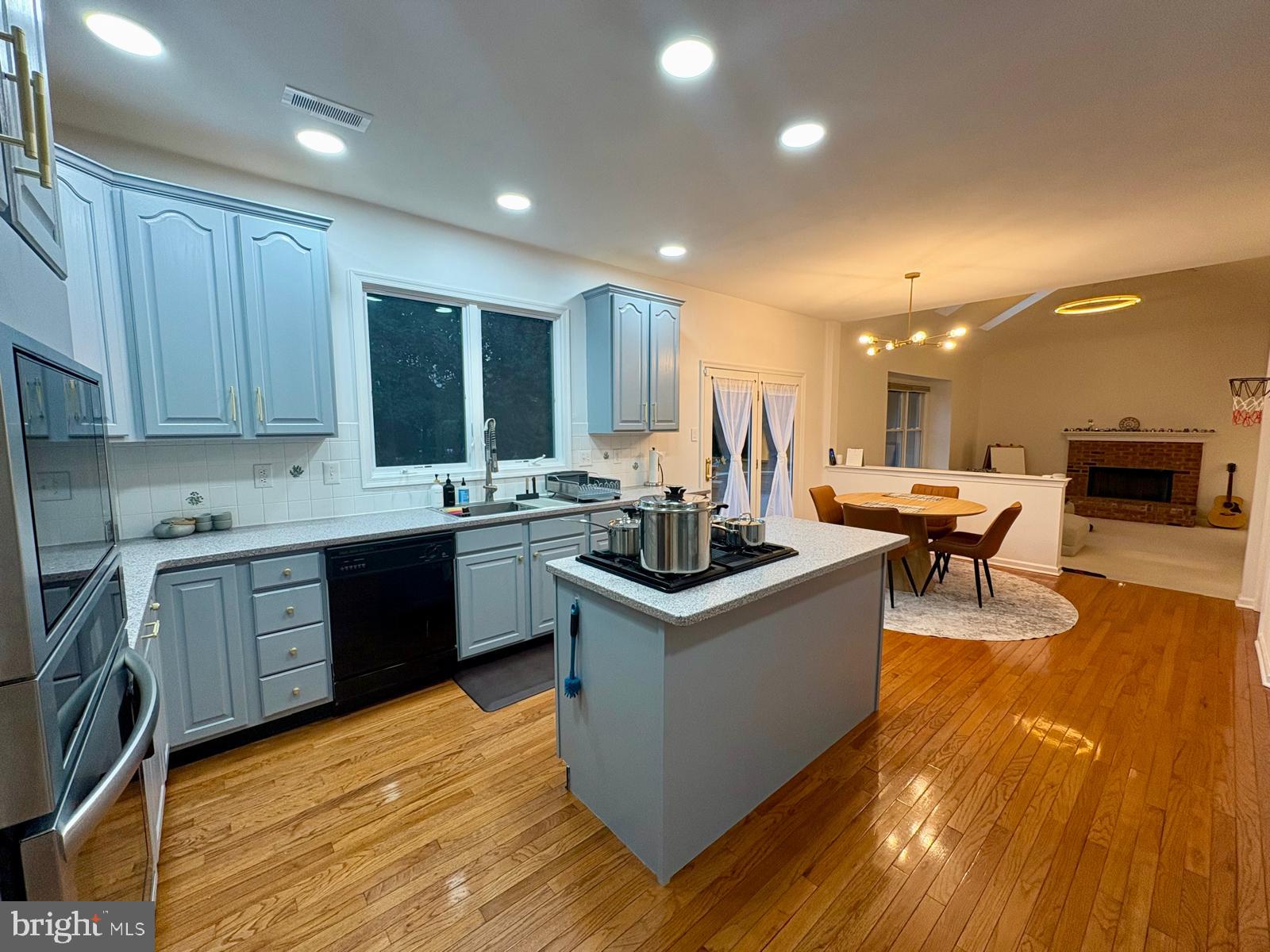 5 Murray Road Moorestown, NJ 08057 - Photo 27 of 55 a kitchen with stainless steel appliances granite countertop a sink and a stove top oven