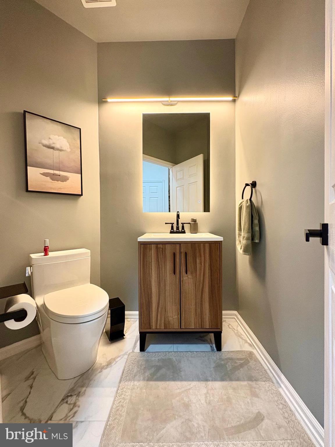 5 Murray Road Moorestown, NJ 08057 - Photo 33 of 55 a bathroom with a toilet a sink and mirror
