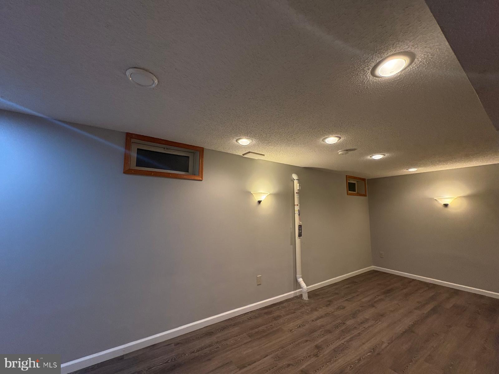 5 Murray Road Moorestown, NJ 08057 - Photo 34 of 55 an empty room with wooden floor and windows