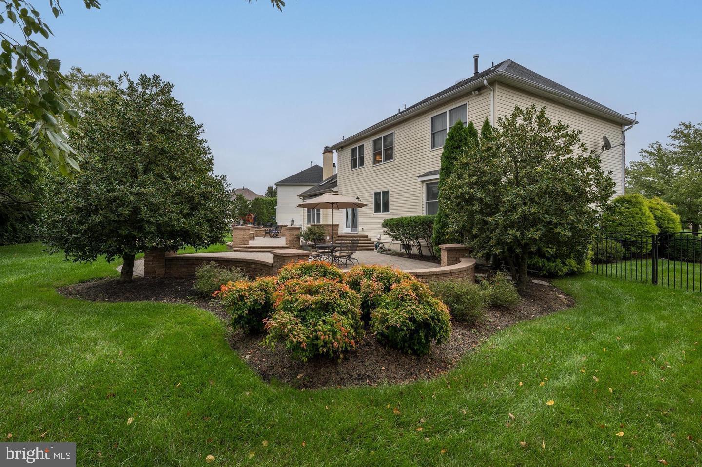 5 Murray Road Moorestown, NJ 08057 - Photo 6 of 55 a front view of a house with garden