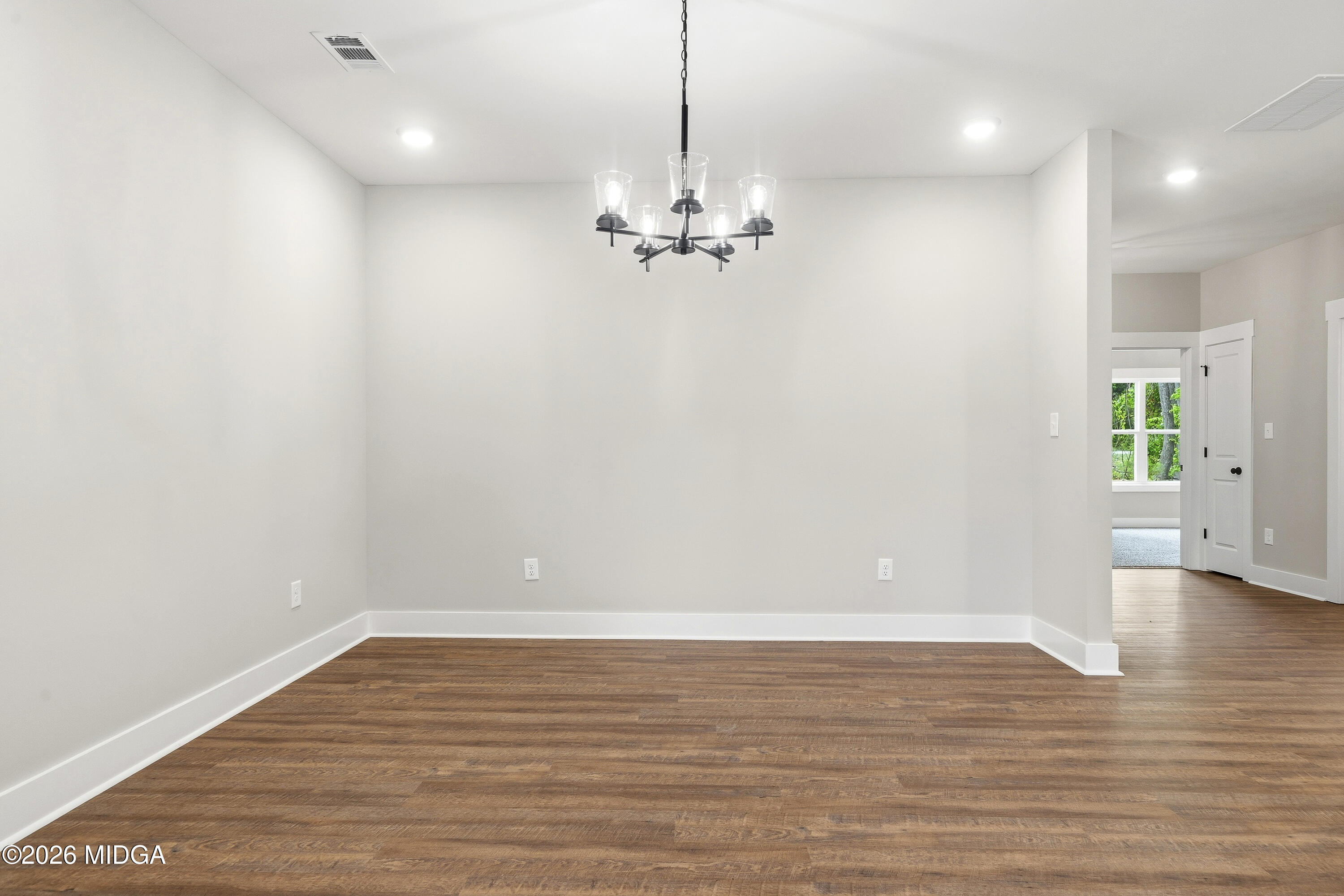 146 Overland Way Gray, GA 31032 - Photo 20 of 38 a view of a room with wooden floor and ceiling fan