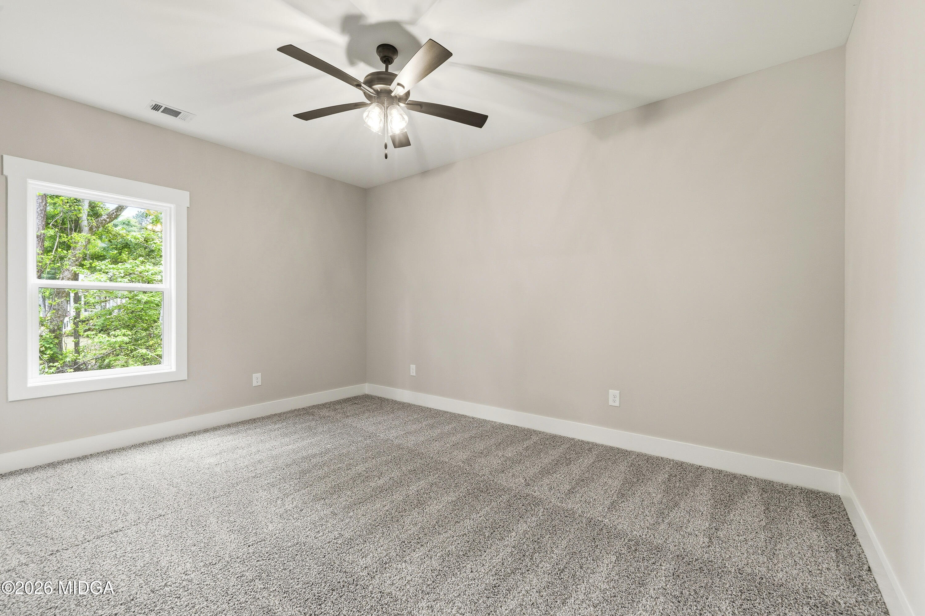 146 Overland Way Gray, GA 31032 - Photo 31 of 38 an empty room with a window