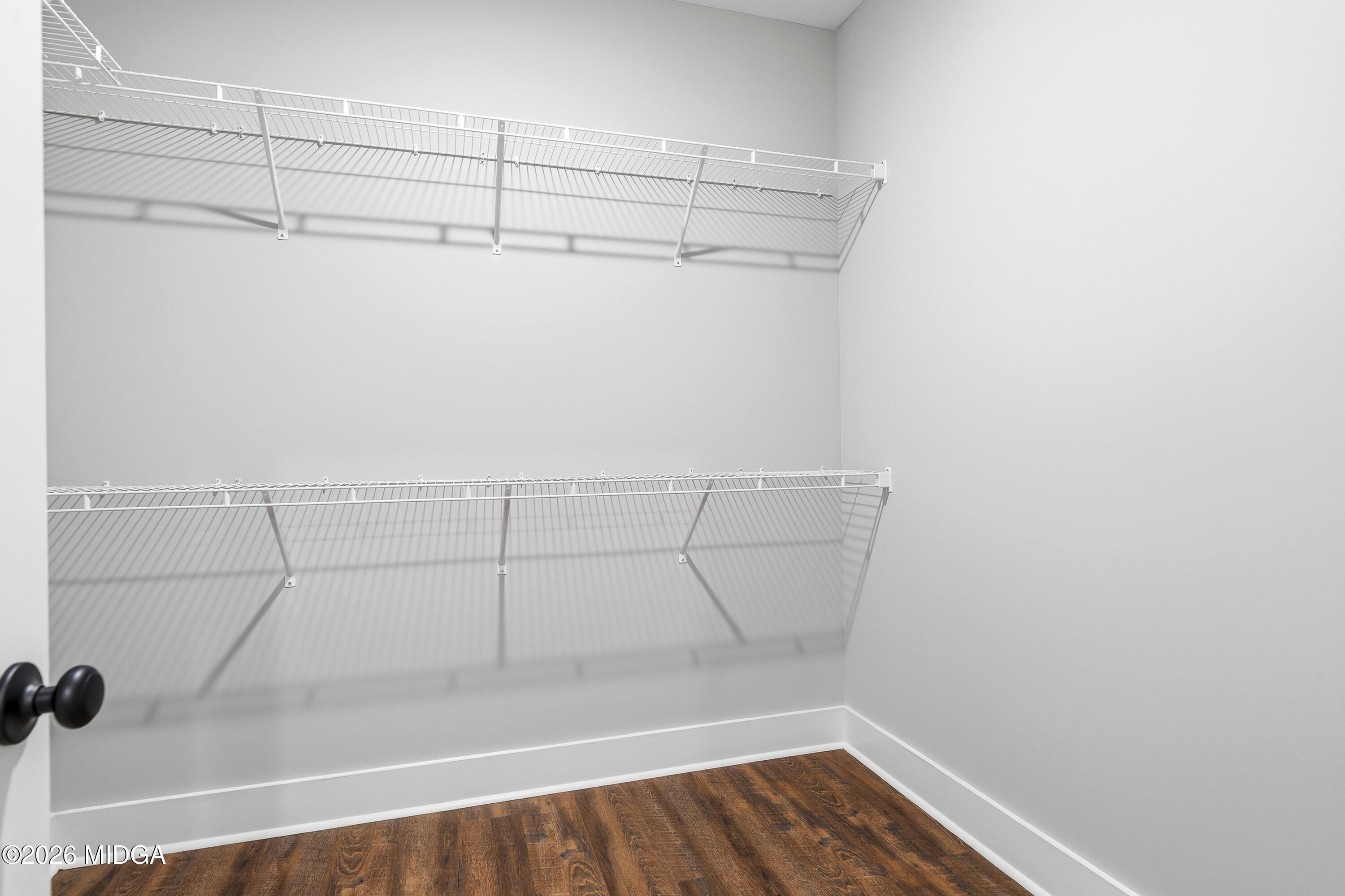 146 Overland Way Gray, GA 31032 - Photo 33 of 38 a view of a room with racks on the wall