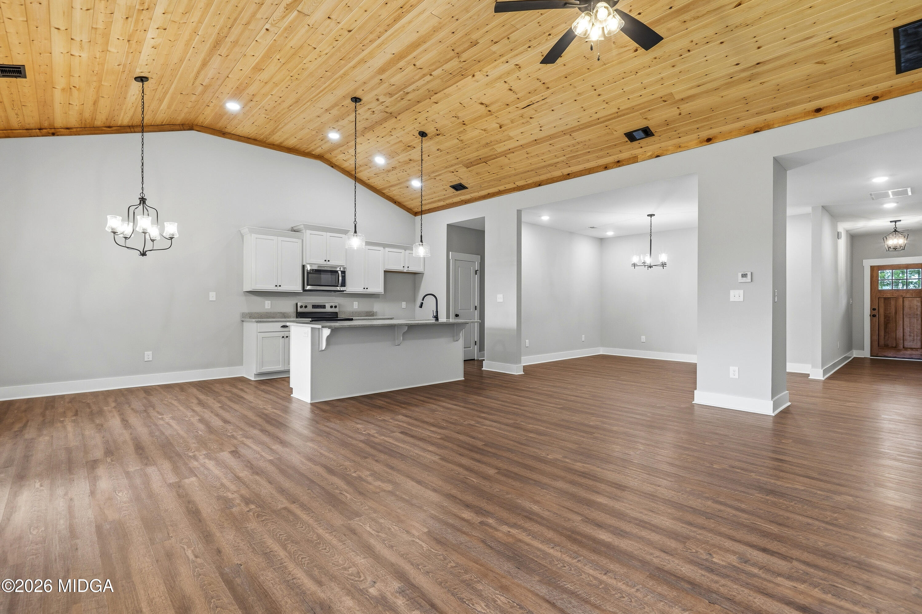 146 Overland Way Gray, GA 31032 - Photo 6 of 38 a view of a kitchen with a sink and wooden floor